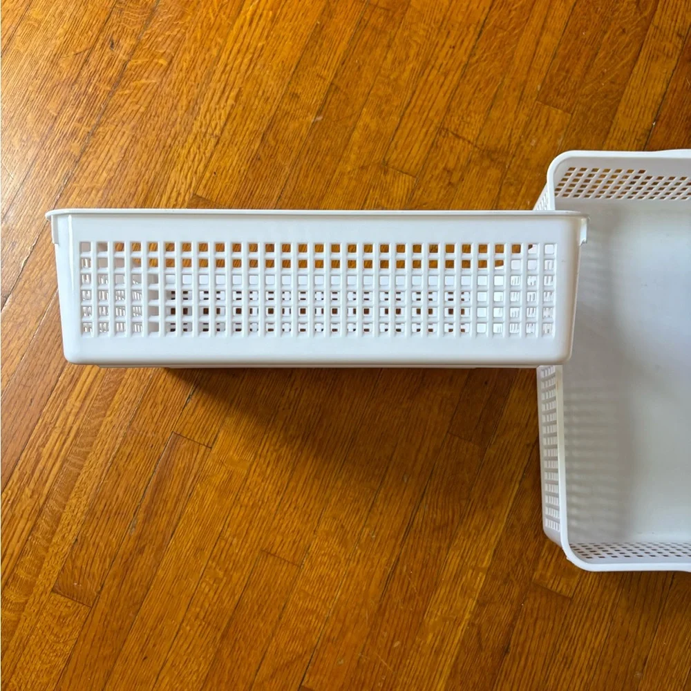 2 White Plastic Basket Storage Bins